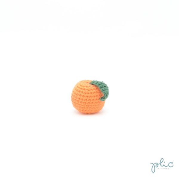 Petite boule de 3,5cm de diamètre avec feuille, le tout crocheté par Plic.