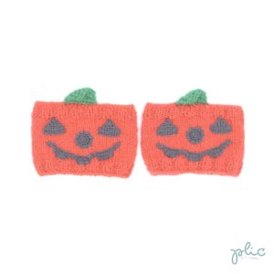 Bandes circulaires de 8cm de haut sur 11cm de large, réalisées au tricot par Plic et représentant des citrouilles décorées pour Halloween.