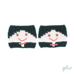 Bandes circulaires de 8cm de haut sur 11cm de large, réalisées au tricot par Plic et représentant le visage d'un petit vampire.