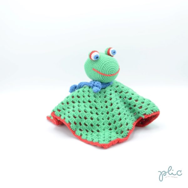 Double carré de 25cm de côté réalisé au crochet par Plic, avec une tête de grenouille au centre.